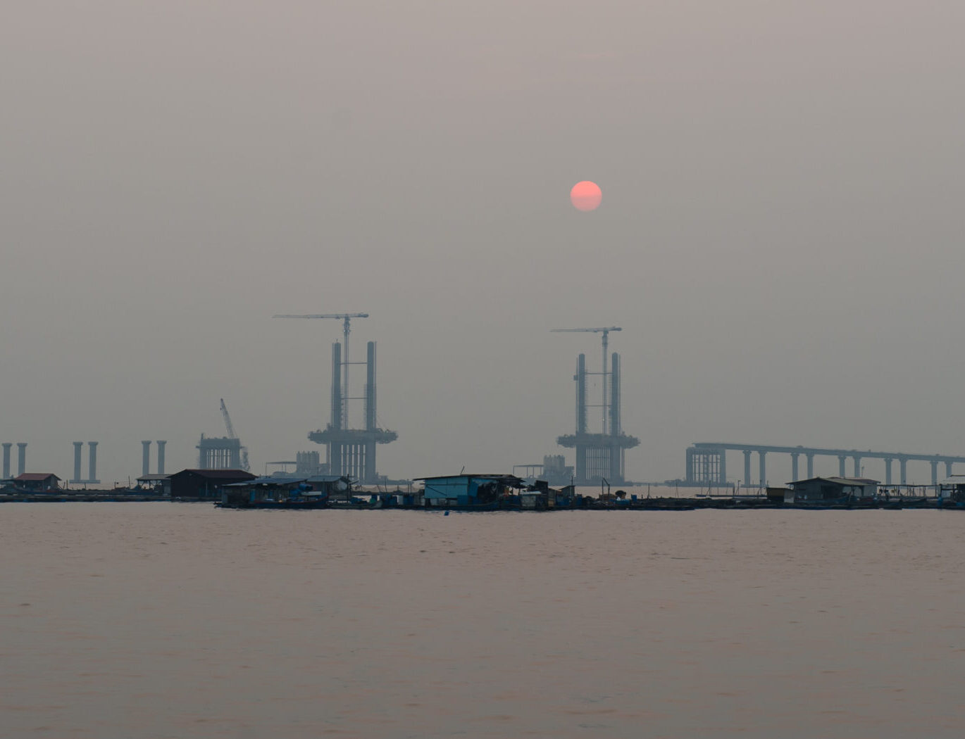 Sunrise over the construction piling, Penang second bridge, Malaysia